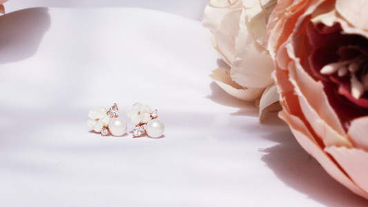 White blossom stud earrings